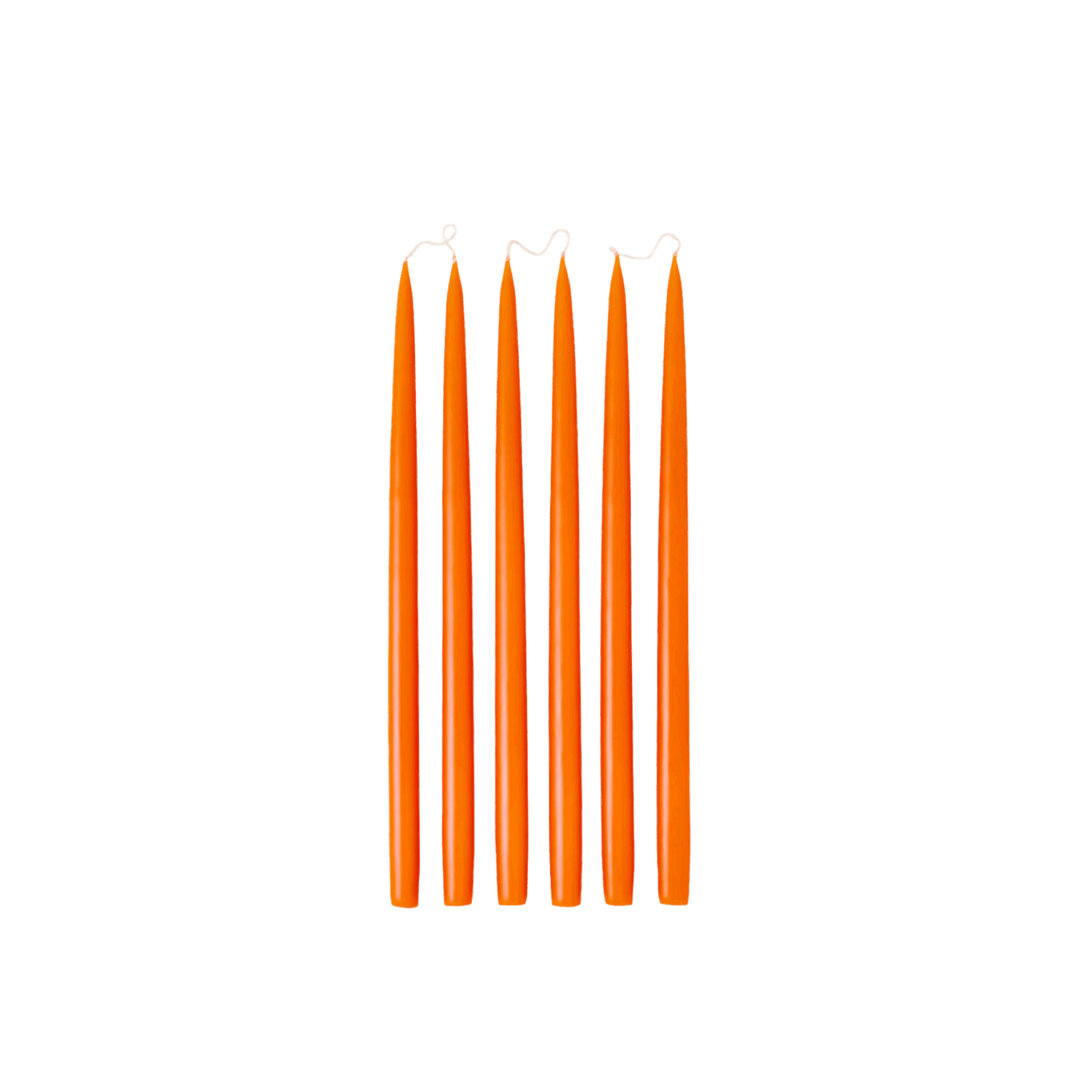 Five orange candles with wicks on a black background