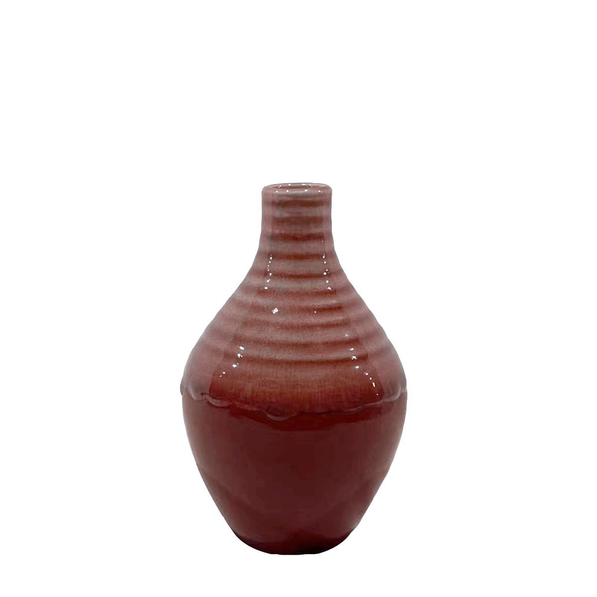 Red ceramic vase with textured surface on a black background