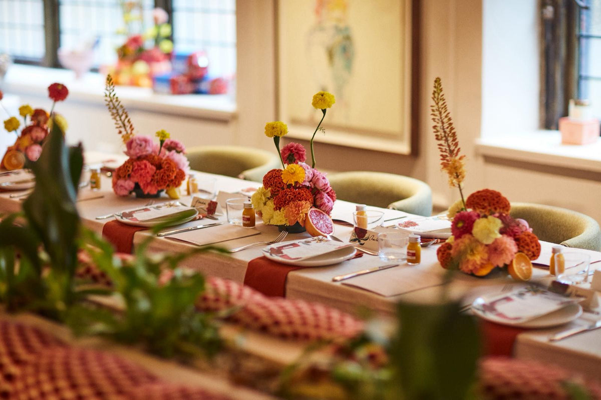 Decorative table setting with floral centerpieces in a home setting